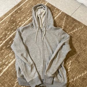 grey zip up sweatshirt